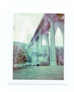 The Saint John's Bridge with an extra green tint on shot on Expired Polaroid Peel Apart Film