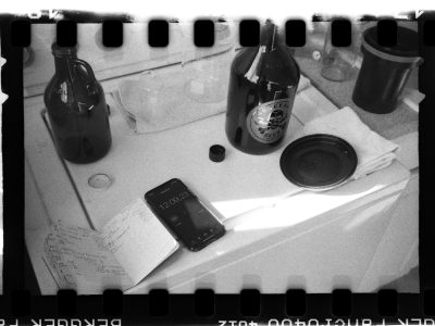 a black and white photo of home film developing.